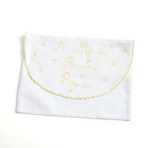 First yellow embroidered garment bag